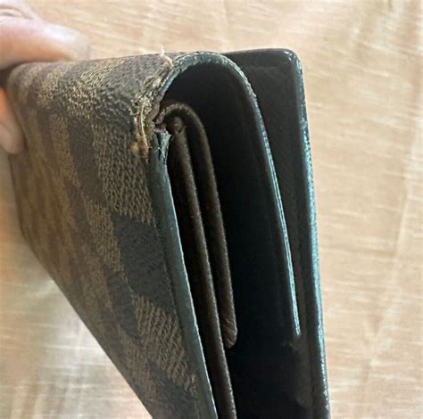 ebay louis vuitton wallet fake|Louis Vuitton wallet authenticity code.